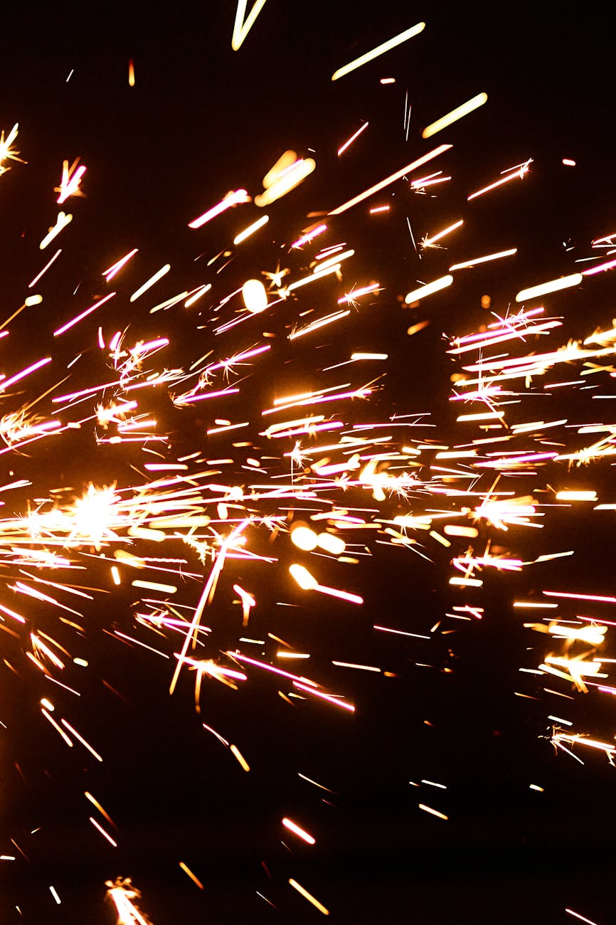 flashing sparks on black background
